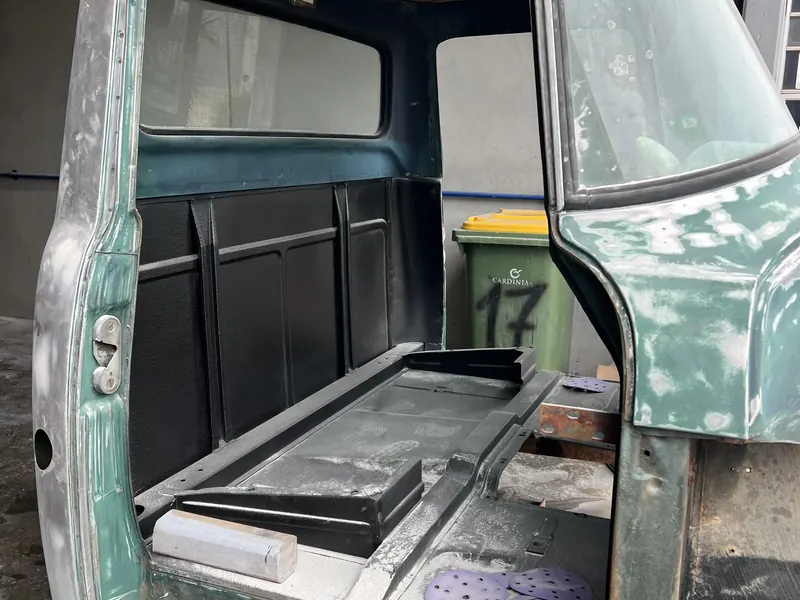 A classic truck cab filled and sanded before paint