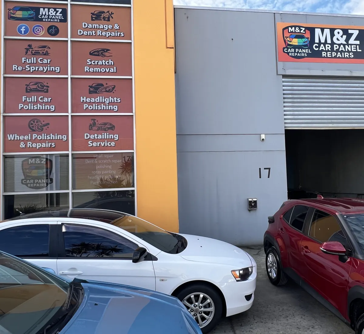 The front of the M&Z Car Panel Repairs workshop at Factory 17, with the service signs in the windows