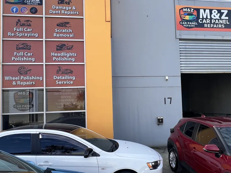The front of the M&Z Car Panel Repairs workshop at Factory 17, with the service signs in the windows